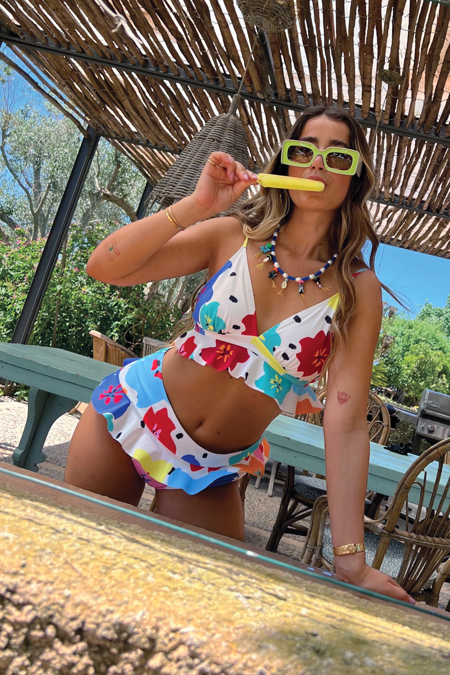 Model wearing Dotty Bikini Top standing facing the camera