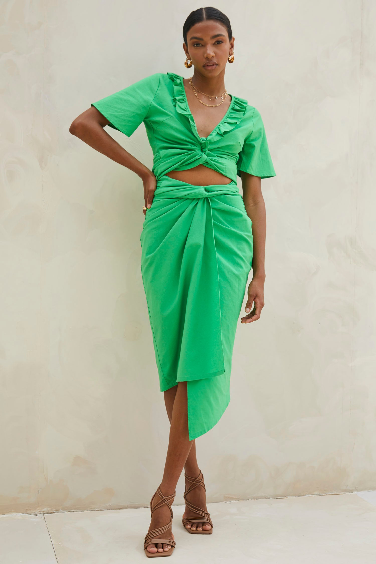 Model wearing Green Cotton Linen Roma Top standing facing the camera