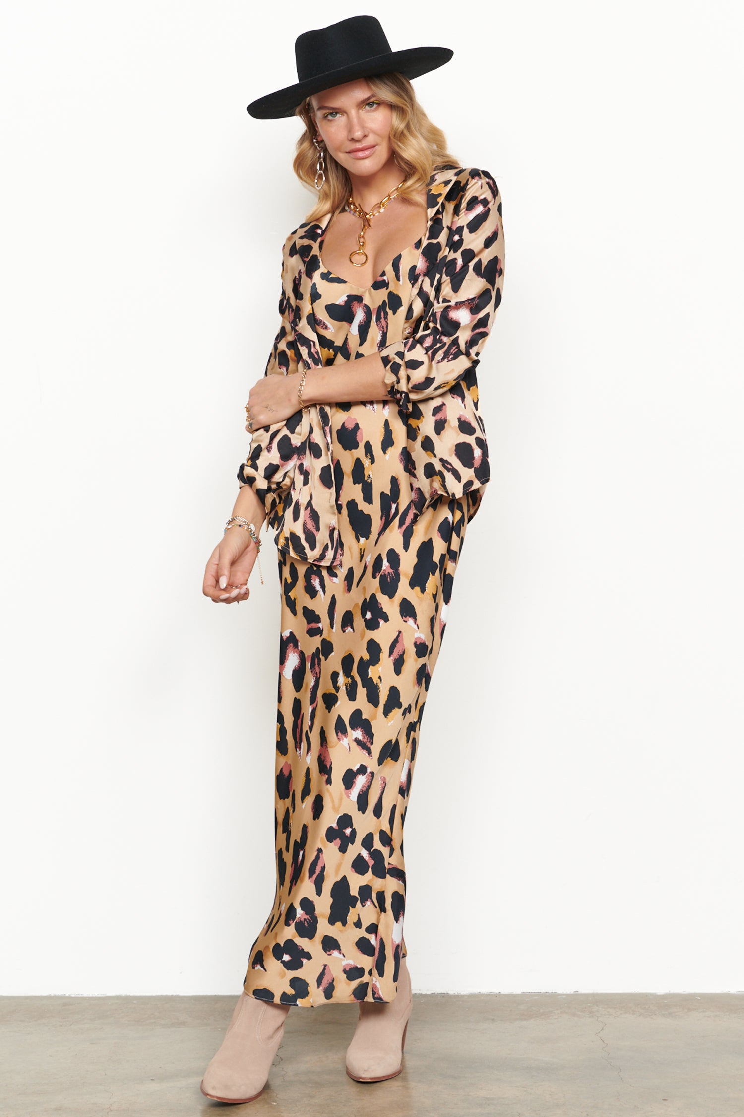 Model wearing Brown Leopard Camille Slip Dress standing facing the camera