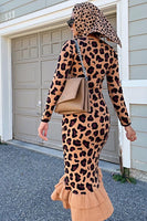 Thumbnail for Model wearing Leopard Headscarf standing facing away from the camera