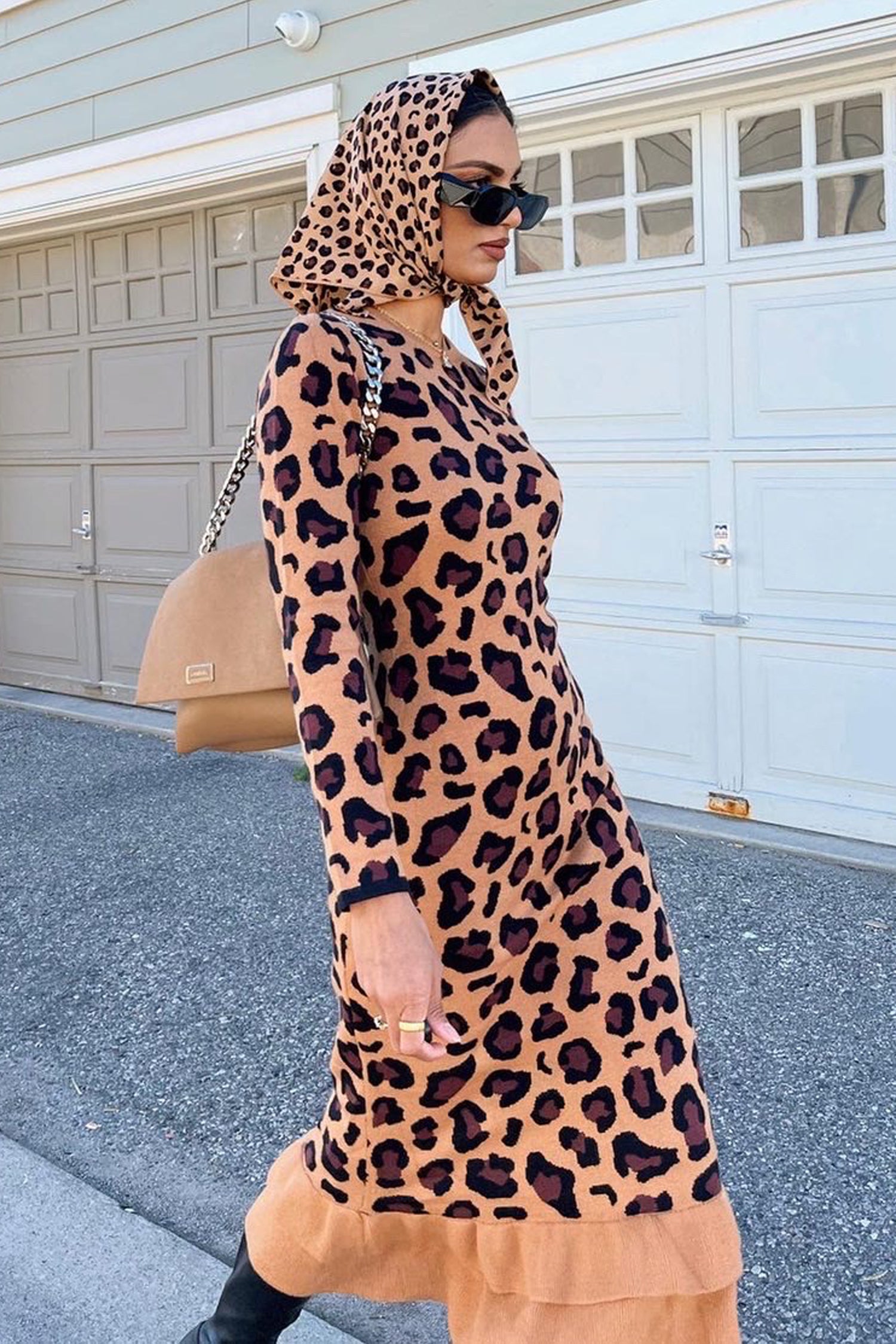Model wearing Leopard Headscarf standing facing the camera