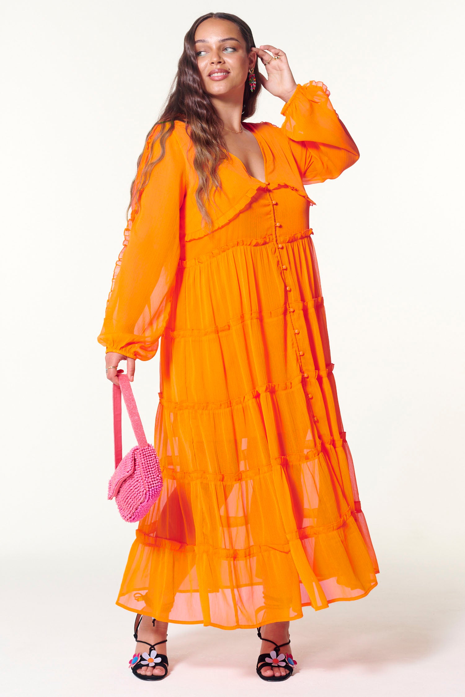 Model wearing Orange Clemmie Dress