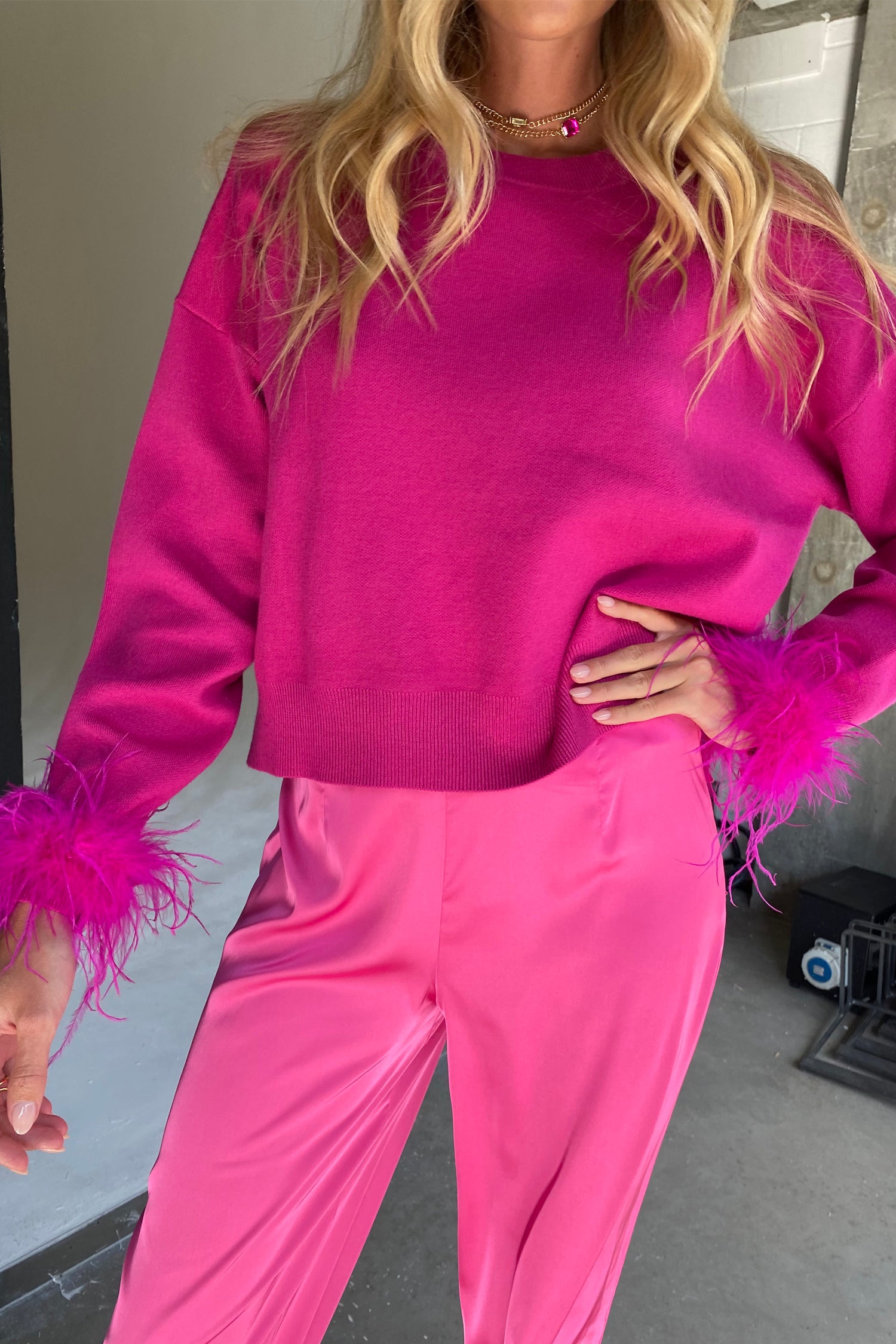Model wearing Pink Freya Trouser standing facing the camera close up
