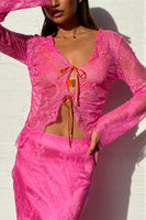 Thumbnail for Model wearing Pink Lace Top standing facing the camera close up