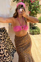 Thumbnail for Model wearing Pink Palm Bikini Top standing facing the camera close up