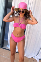 Thumbnail for Model wearing Pink Palm Bikini Top standing facing the camera