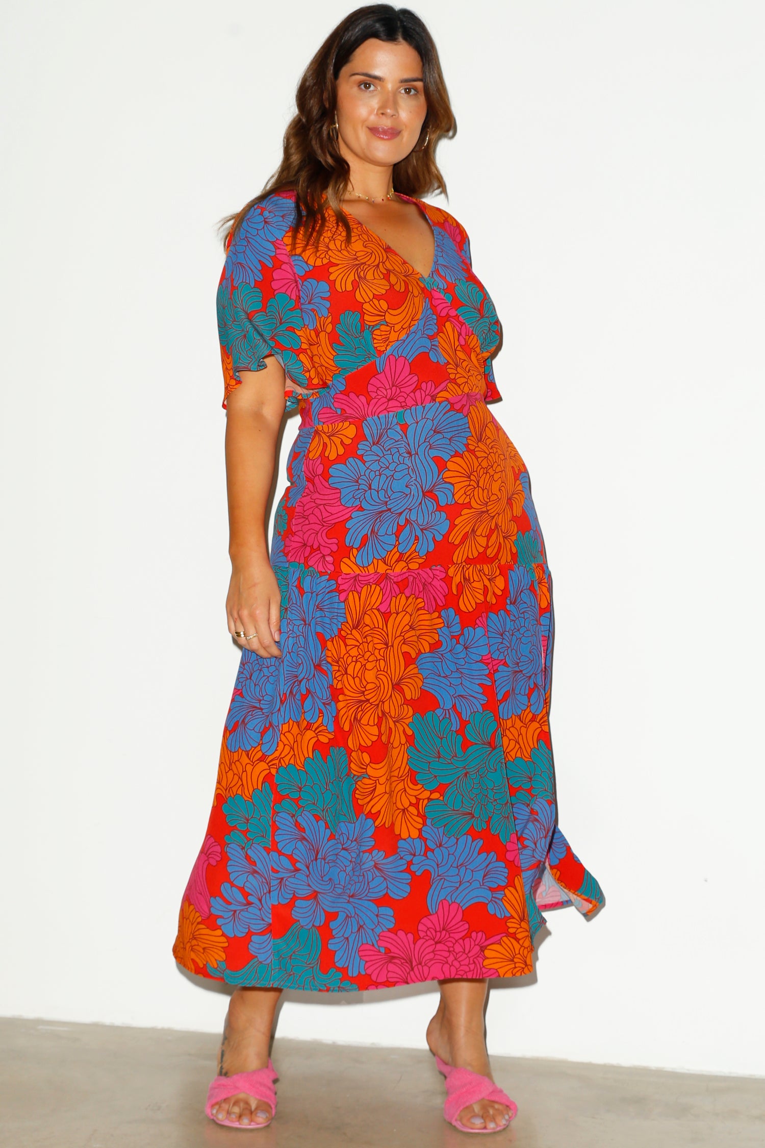 Model wearing Tabitha Floral Claver Dress facing towards the camera 