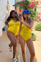 Thumbnail for Model wearing Yellow Palm Swimsuit facing the camera