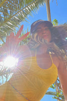 Thumbnail for Model wearing Yellow Palm Swimsuit close up